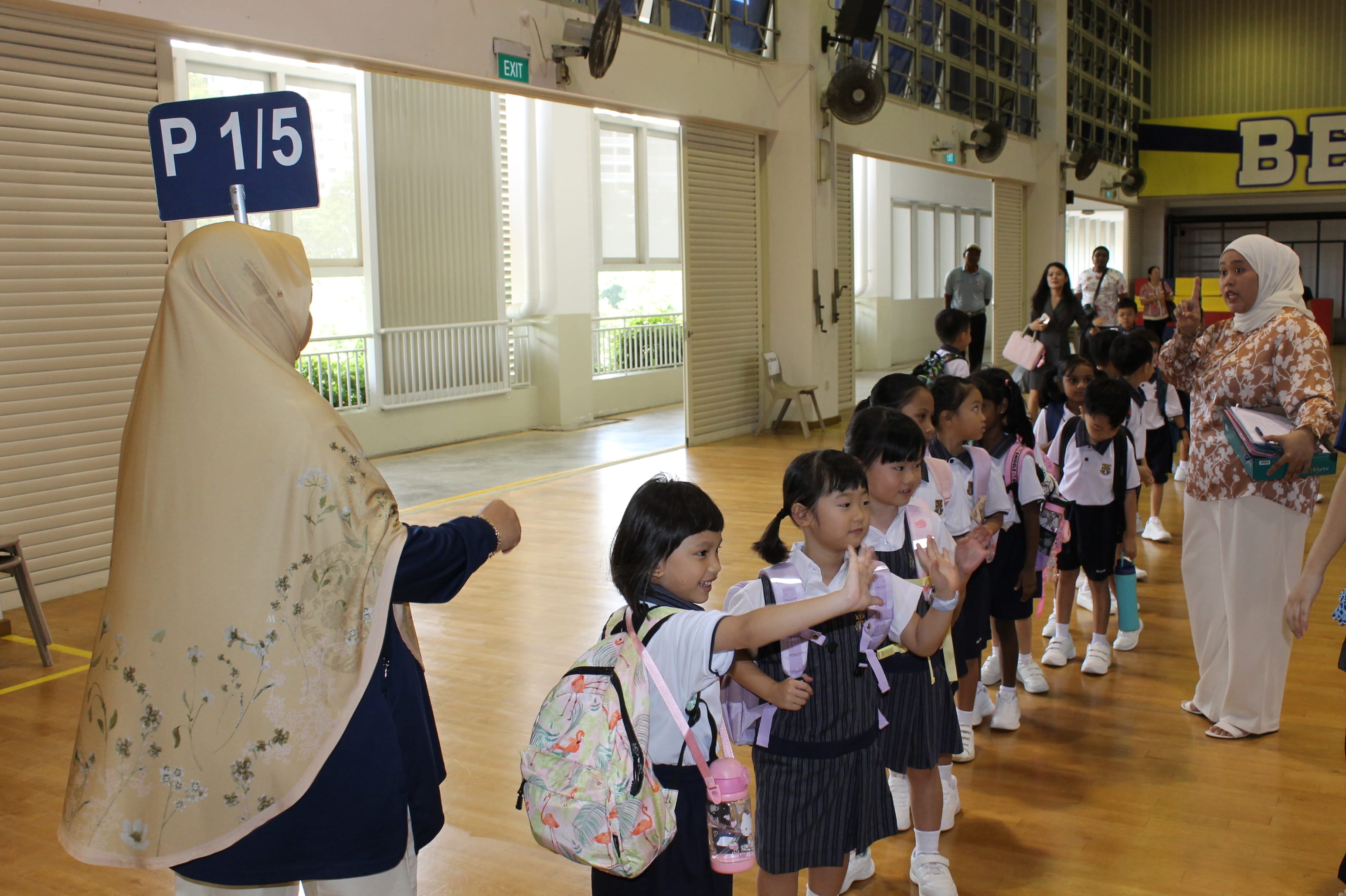 Students saying goodbye to their parents